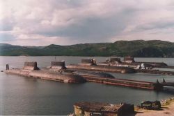 toocatsoriginals:  Five of the six Typhoon-class submarines produced at their docks. 20 missiles each, with up to 10 warheads per missile, equals up to 1000 warheads in this photo. Enough firepower to cripple or exterminate humanity. On a side note -