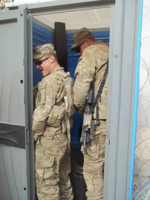 checking out his military buddy’s cock while he takes a piss