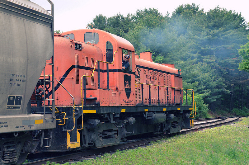 Everything about the Batten Kill RR is old school. Here, a pipe-smoking engineer without any reflective gear shoves a string of grain cars with a Schenectady built 1952 RS-3.