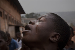 latenightpersonality:  A young inmate cries in the prison yard after a fight. 