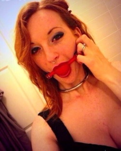 beautyintheballgag:  Sexy redhead shows off