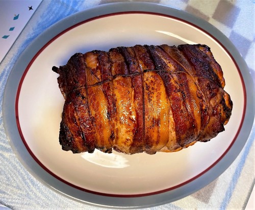 Haggis-stuffed Pork Roast Wrapped in Bacon!Used a filet knife to butterfly the pork roast into a she