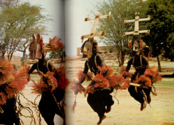 autosafari:  Masked Dogon dancers performing a funeral rite, Mali. 