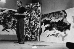 jamesusilljournal:                   Jackson Pollock stands amid some large paintings in his studio at ‘The Springs,’ East Hampton, New York, photo Tony Vaccaro, August 23, 1953