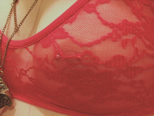 moneypowerloverespect:  3 of my favorite things. Red , lace & my darling piercing. 