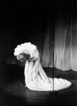 wehadfacesthen:Marlene Dietrich takes a bow at the Théâtre de l’Étoile, Paris, 1959, wearing the Jean Louis swansdown cape