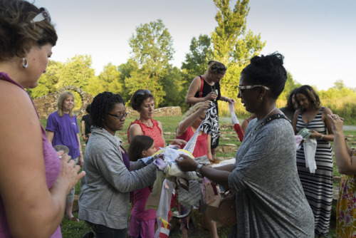 Reading the dreams from the Diversity Dream Scroll with students, faculty and friends. Photo credit Gregory Wendt