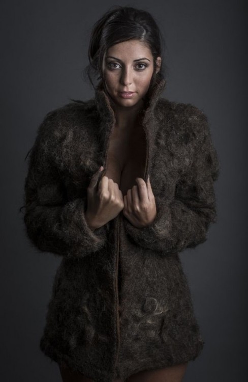 This is a Man-Fur coat made entirely out adult photos