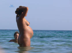Pregnant and nude