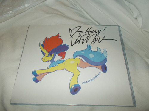 I got my Keldeo pic signed by none other than Vic Mignogna. I also gave him a laminated copy and he 