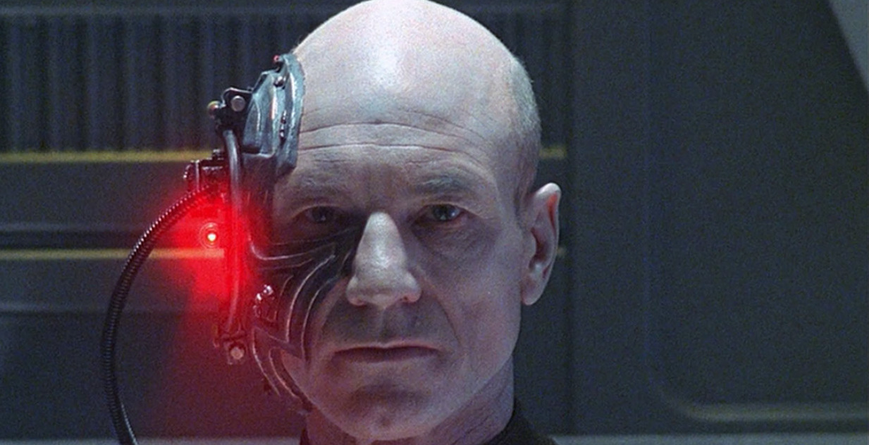 Patrick Stewart as Locutus. Both of his eyes are visible.