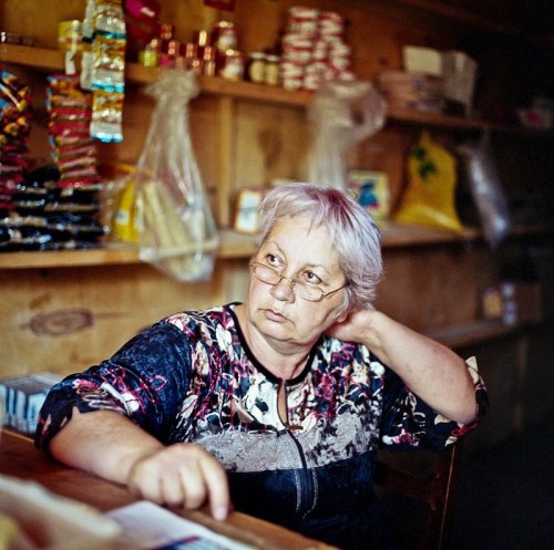 Portrait of Olga Sabievi, who runs a small store in Nikozi and now has no custumors due to the close