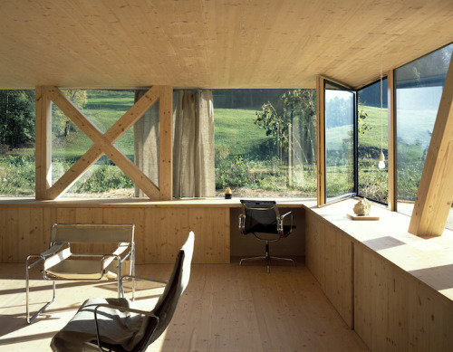 doeyzooey:  Zurich-based architect Pascal Flammer designed this timber house in Balsthal, Switzerland, which is sunken 2.46ft (75cm) with ground-level wrap around windows, connecting it with nature in a special, unique way.  Please….. I want it