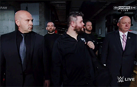 mithen-gifs-wrestling:  Kevin Owens is escorted from Raw–much to his annoyance.