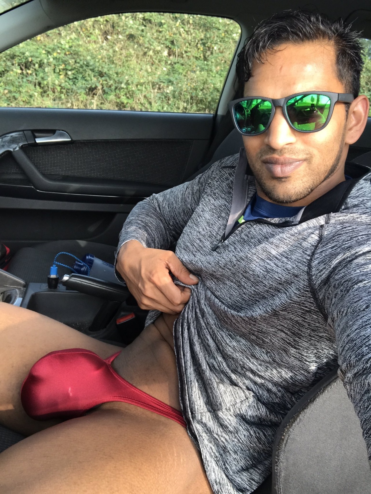 desibeefcake:  Desi beefcake in a sexy red thong, asking to be pounded.