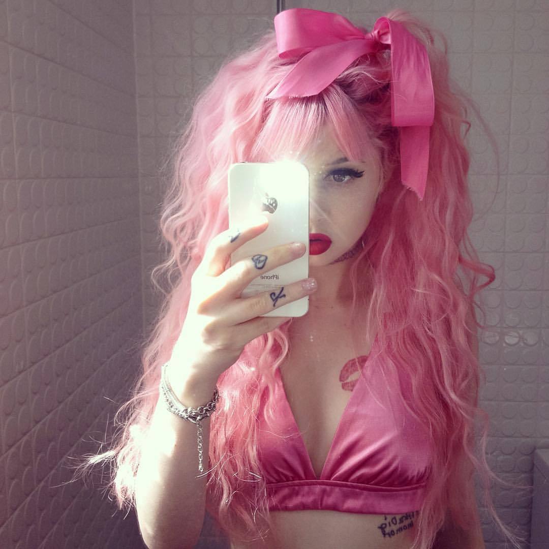 kimdixi:  Bitch face 😒 Pink satin set (top) and rainbow choker from @hiddencult