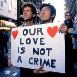 lgbt-history-archive: “OUR LOVE IS NOT A CRIME,” demonstrators protest the United States Supreme Court’s decision in Bowers v. Hardwick (1986), which upheld as constitutional state laws criminalizing sodomy, c. July 1986. Photo by Chuck Nacke, ©