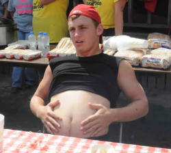 lyricmpregcentral:  calicollegefatty:  ballgutdudes:  Submission from a bud!  Eating contests are hot.  Agreed.