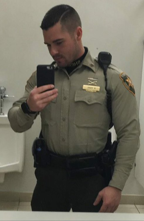 policecorps:  dehnerboot: hotuniformedmen: Such a hot man in uniform, wouldn’t mind dating a hot guy like this!!  I feel like violating some kind of law right now…   Never get tired of seeing this guy