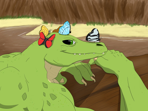 Alligator on a log with some butterflies. Would you join him?