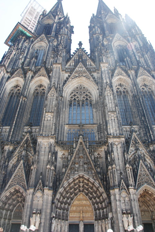   The outer facade and the portico statues of the Köln cathedral in Germany. This gothic cathedral 
