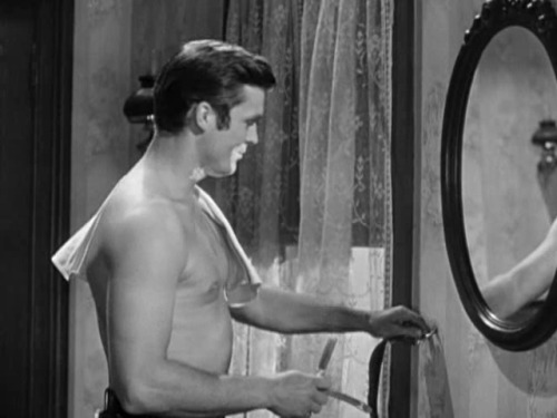 Bronco S01E12 Bronco (Ty Hardin) having a shave and later having his slumbers disturbed by an attack