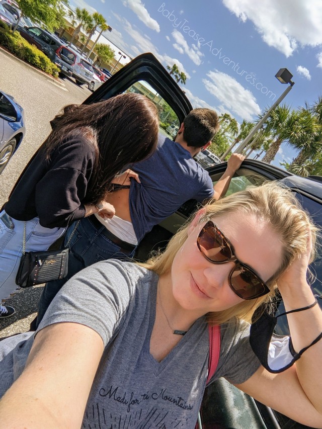 babyteaseadventures-deactivated:Mommy had too much fun last night but life goes on. Miss Jess to the rescue! She helped keep the little hippo in line at the grocery store! Parking lot diaper checks for the baby. The people in the car next to us thought