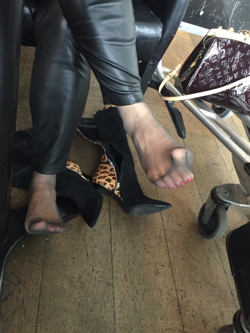 wifey in  grey sheer socks. nylon teasing at the airport!