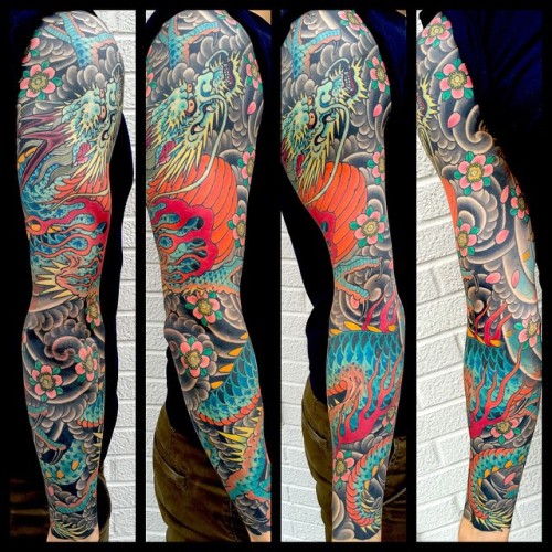 kingsavetattoo: #dragon #wind #cherryblossom #sleeve #tattoo @kingsavetattoo #mikerubendall #rubenda