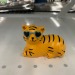 shiftythrifting:This tiger is unbothered, happy, in their lane, focused, flourishing,