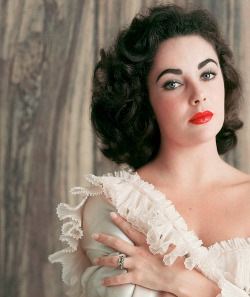 dailyelizabethtaylor:   My god, I had black hair — it was photographed blue-black it was so dark — and thick bushy eyebrows. And my mother and father had to stop them from dying my hair and plucking out my eyebrows. The studio even wanted to change