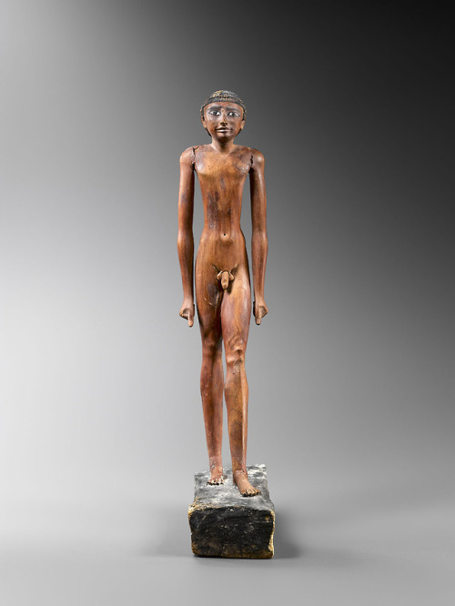 Statuette of a nude man (wood and pigment). Late Old Kingdom, 6th-8th Dynasty, ca. 2345-2160 BC. Ex 