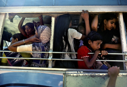 20aliens:  INDIA. State of Kerala. 1989. Trivandrum. People on a bus.Harry Gruyaert 