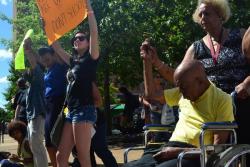  Houston Gay, a 103 year old who marched with MLK 50 years ago, at a peaceful demonstration in Ferguson. 