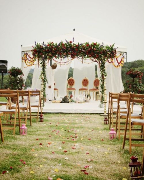 A very pretty floral mandap for this Hindu Wedding with Multicultural Backgrounds on the blog. Photo