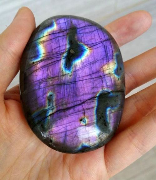 geologyin-blog: Stunning polished Purple Labradorite from Madagascar Photo: Georgios Chatziparaskeva