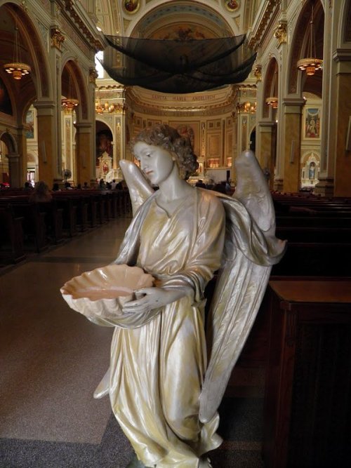  Holy water font in the entrance of Saint Mary of the Angels Catholic Church Chicago Illinois 