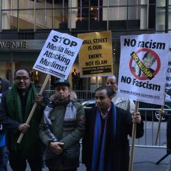 fuckyeahmarxismleninism:  HAPPENING NOW: People are gathering for ‘Stop racist Trump’ protest at Trump Tower, 56th Street and 6th Ave., New York. Join us!   Photo by Joe Piete 