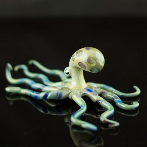 sosuperawesome:  Octopi pens, terrariums, glasses, straws - including glow-in-the-dark - bar and serving utensils and figurines by FullBlownGlass on Etsy• So Super Awesome is also on Facebook, Twitter and Pinterest •  