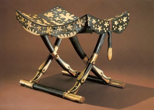 grandegyptianmuseum:Model folding stool, from the Tomb of Tutankhamun (ebony, paint, gold with inlai