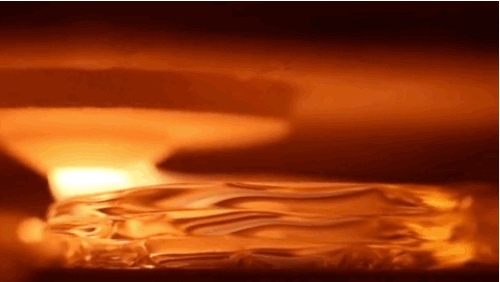 mentalflossr:  Watch This 3D Printer Print Mesmerizing Glass Goo