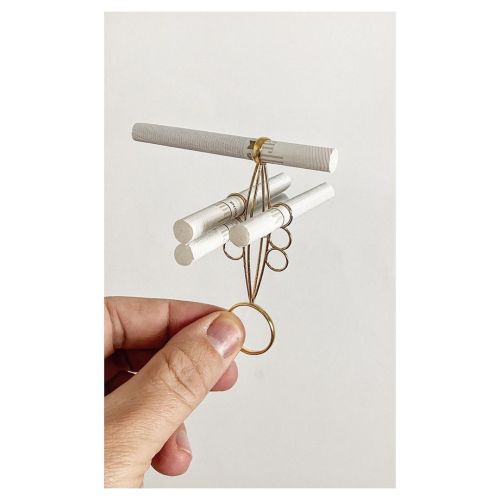 The Horizontal Cigarette Holder…•We don’t condone smoking (the request to design a cigarette hol