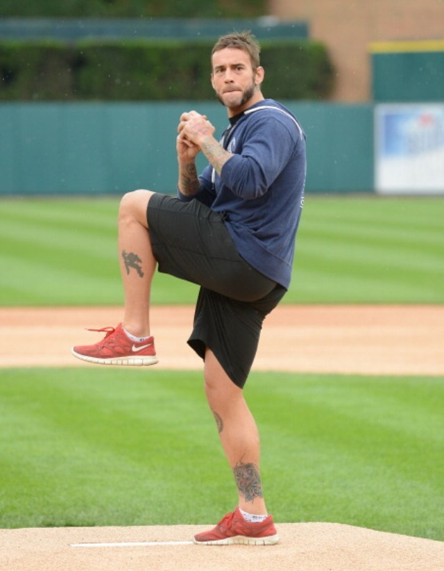 joannhutch1976:  Cm punk throws out the first pitch prior to the game between KC