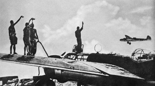 Sailors cheer as planes take off from a carrier to attack PearlHarbour (December 7th,1941).Japanese 