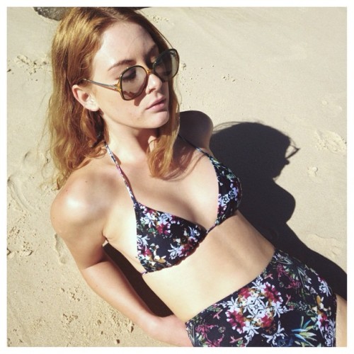 Warming up ☼ Zoe wears our midnight tropic triangle top and pinup bottoms #castaway #castawaylabel (at www.castawaylabel.com)