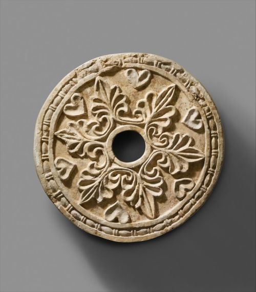 Roundel with radiating palmettes Period: Sasanian Date: ca. 6th century A.D. Geography: Mesopotamia,