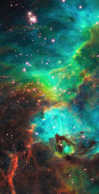 astronomicalwonders:  Star Cluster NGC 2074 in the Large Magellanic Cloud Hubble peered into a small portion of the nebula near the star cluster NGC 2074 (top). The region is a firestorm of raw stellar creation, perhaps triggered by a nearby supernova