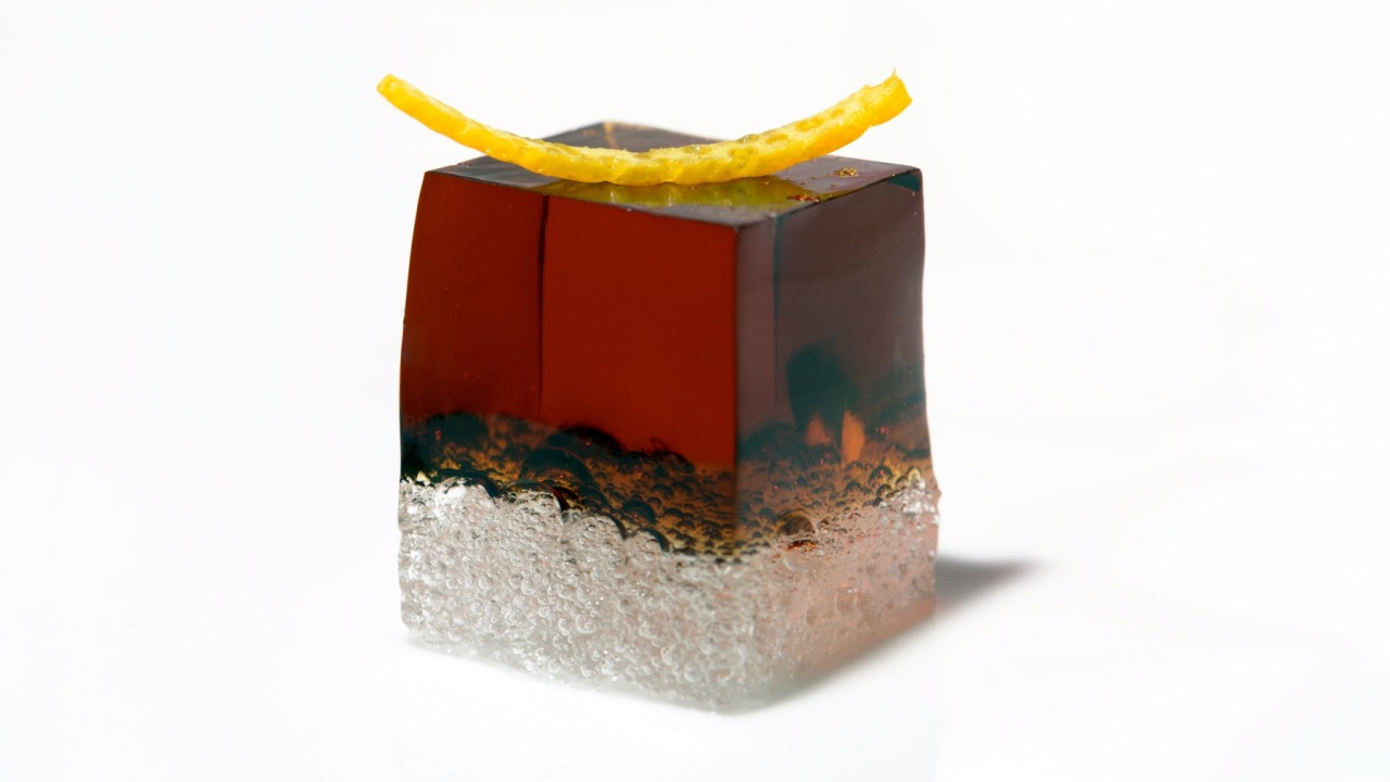 A cube of Yzaguirre vermouth with orange peel (Source: Jordi Artal’s Potatoes Make Your Potatoes Look Like Garbage)