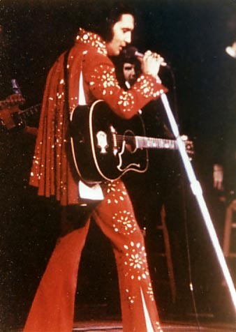 ilovetheking-elvispresley:  Elvis in red. :) 