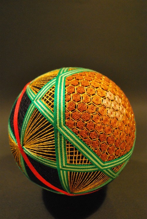 asylum-art:  A Huge Collection of Embroidered silk  Spheres by  92-year-old grandmother